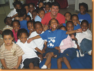 Dan with preschoolers after a fun and exciting rhythm workshop